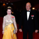 Kong Harald og Dronning Sonja på vei inn til feiringen av ASF (Foto: Lise Åserud / Scanpix)